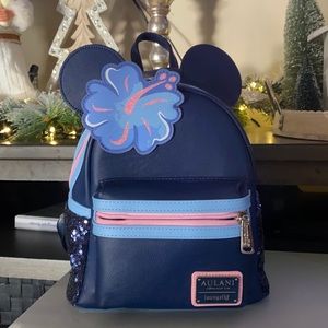 Gently Used Disney resort Aulani mini loungefly backpack